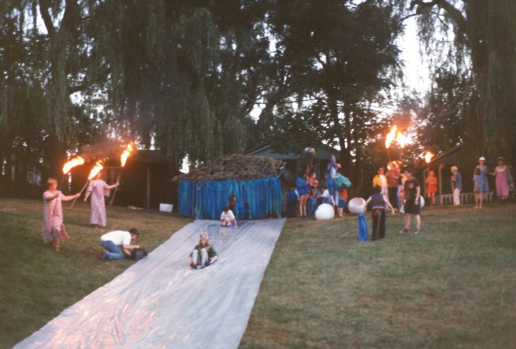 The 1998 pageant Arum Dem Fayer, a night of fire and theatre that involved the entire Camp community