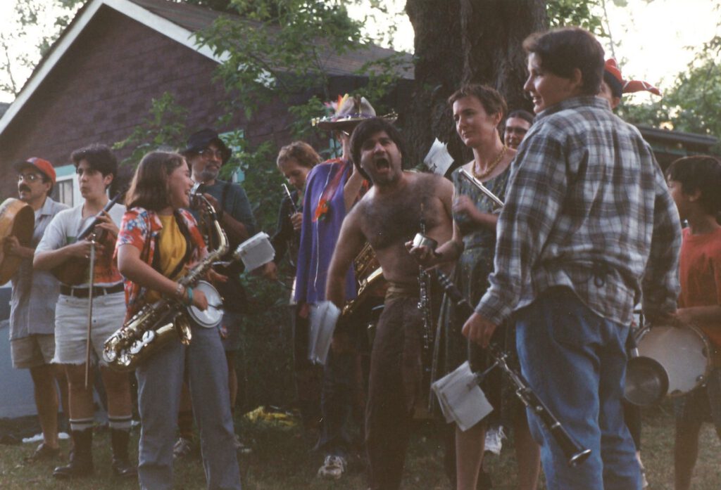 A camp klezmer/marching band performs during a pageant procession
