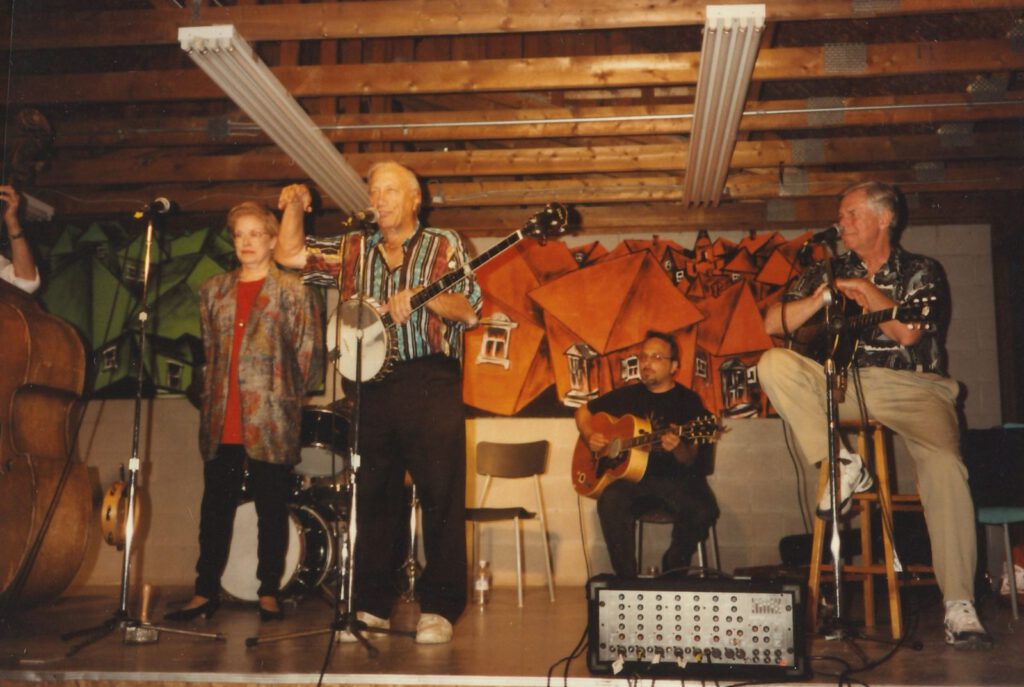 A folk band performs on the Camp Naivelt stage