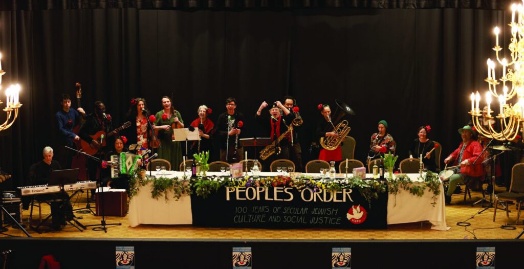 Marching Disorder, formed by Shule parents, regularly perform at UJPO holiday celebrations and political rallies. Here, performing at the 2026 Third Seyder