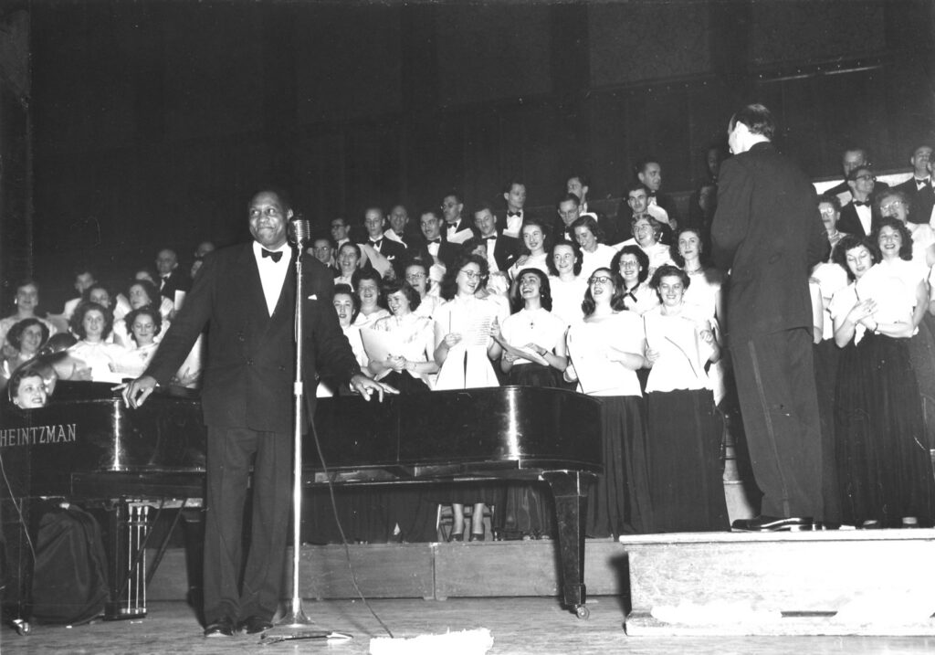 American movie star and internationally-renowned singer Paul Robeson performs at Massey Hall with UJPO’s Toronto Jewish Folk Choir in May 1949