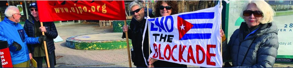 Members of UJPO Winnipeg protest the US/Israeli attack on Iran, 2026